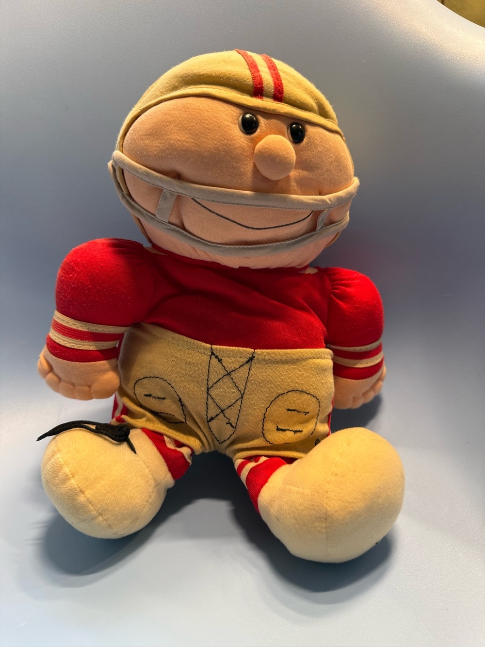 Vintage 1980s San Francisco 49ers NFL football player plush doll.